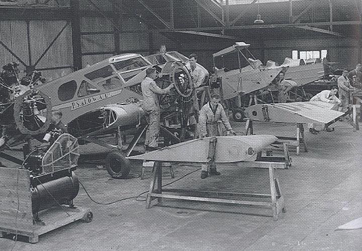 Engineers working on aeroplanes